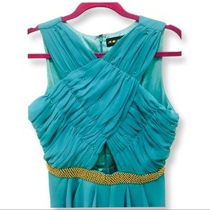 Beautiful Turquoise dress by Virgo’s Lounge